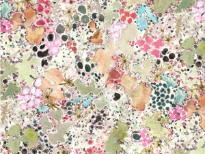 Watercolor floral fabric print in pastel pinks, greens, and blues with a ruler at bottom for scale.