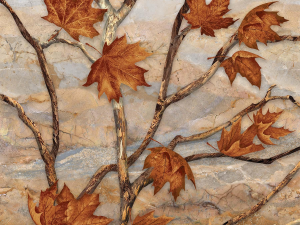 Twisting vines with brown autumn maple leaves against a textured stone wall background.