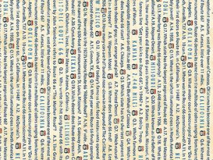 Fabric swatch with dense blue printed text pattern and a centimeter ruler along the bottom edge for scale, close-up view.