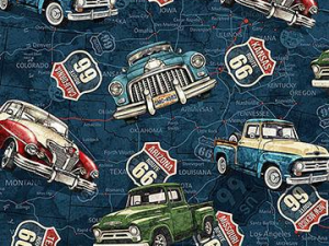 Patterned fabric featuring vintage pickup trucks and Route 66 shields on a blue map background.