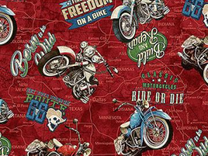 Close-up of red fabric pattern featuring vintage motorcycle illustrations and road-map graphics with slogans like 'Ride or Die' and 'Freedom on a Bike'.